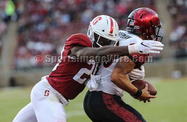 20180831SanDiegoatStanford-08.JPG - San Diego quarterback Christian Chapman (10) is sacked for a safety by Stanford Cardinal line backer Bobby Okereke (20) during an NCAA football game in Stanford, Calif. on Friday, August 31, 2017. Stanford defeated San Diego State 31-10. 